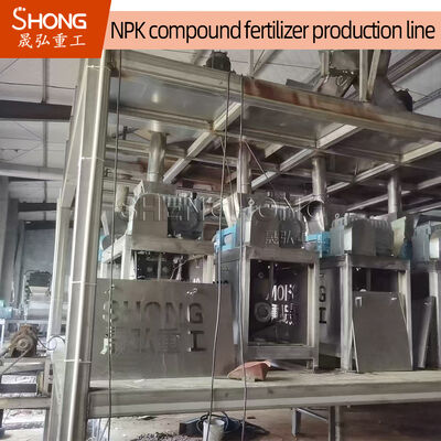 Ligne de production d'engrais NPK avec presse à rouleaux avec alimentation à 40 mailles et granulés de forme ovale pour une tension de 380 V